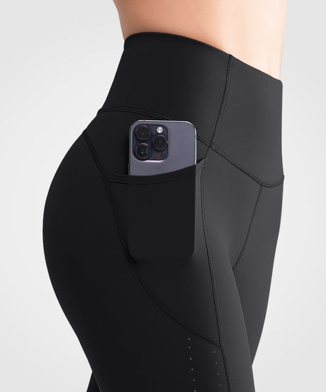 Echo biker shorts med hög midja, fickor och sidoperforering 20 cm | Damsportshorts med högt stöd